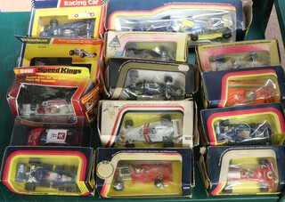 A collection of 1970's Corgi and Dinky racing cars, all boxed (boxes all in poor condition) to include Dinky Hesketh 308 and Ferrari 312, a Matchbox K-44 Surtees F1, Corgi Elf Tyrrell Project 34, 162 Patrick Eagle racing car 159, Hesketh 308 F1 160, Lotus Formula One 154, Gift Set 29 Duckhams Formula One Surtees Racing set, UOP Shadow 155, Graham Hill's Embassy Shadow 156, Cann-am Porsche 917-10 397, Elf Terrell Project 34 161 and Ferrari 312 B2 152 