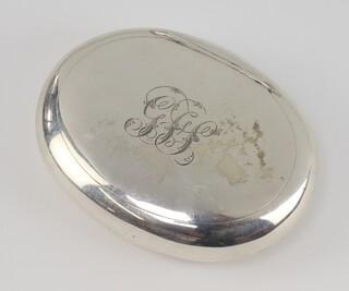 A silver oval tobacco box with engraved monogram, Chester 1916, 87 grams 