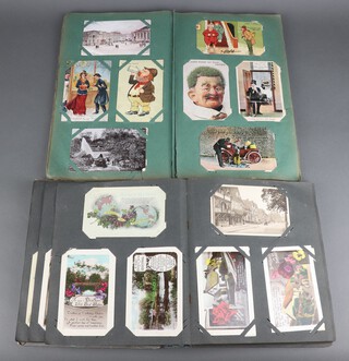 Three Victorian and Edwardian post card albums with contents including later postcards, coloured and black and white photographs 