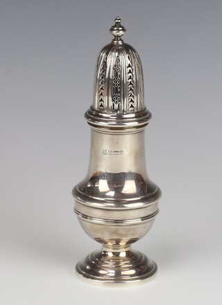 A Queen Anne style silver sugar shaker of plain form, Birmingham 1966, 17cm, 133 grams 