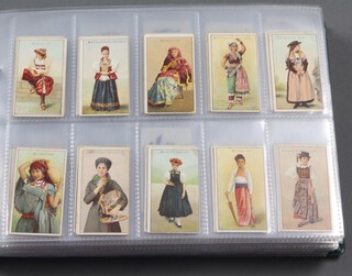 Wills overseas cigarette cards, a binder of sets (some incomplete) to include Flag Girls of All Nations x5 (no Scissors, various backs, some incomplete), Girls of All Nations, Evolution of The British Navy, Products of The World, US War Ships, Movie Stars, Aviation, Arms of The British Empire 