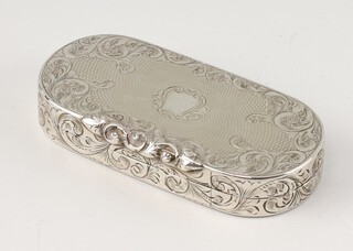 A Victorian rounded rectangular silver vinaigrette with engraved and engine turned scroll decoration, having a floral gilt grill, Birmingham 1840, maker Gervase Wheeler, 4.5cm 