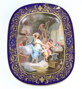 A 19th Century German oval porcelain plate decorated with classical figures, the reverse Venus Bei Vulkan In Der Schmiede impressed marks 1496/42 37cm 