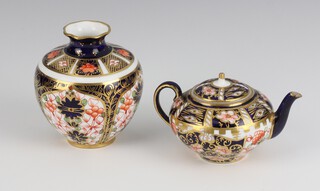 A Royal Crown Derby Imari pattern  miniature teapot and lid no.1491/6299 5cm and a ditto baluster vase 1450 1128 7cm 