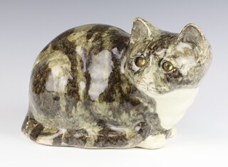 A Jenny Winstanley figure of a crouching cat with glass eyes signed, no.5, 16cm 