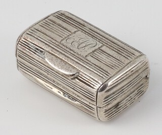 A George III silver engraved vinaigrette with monogram, London 1817, having a geometric gilt grill, 2.5cm