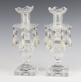 A pair of 20th Century glass lustres raised on square bases 27cm (1 with top a/f) 