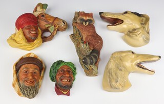 A pair of Art Deco plaster wall masks in the form of Afghan Hound heads 13cm, 4 Bossons wall plaques - 3 of tribesmen, 1 of a raccoon 