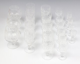 A 22 piece suite of Waterford Colleen pattern glassware comprising 4 champagne flutes, 5 wine glasses (1 with chip to base), 3 brandy balloons, 5 sherry glasses (2 with chips to rims), 4 liqueur glasses 