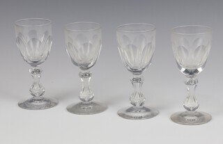 Four 19th Century panel cut liqueur glasses (1 with chip to rim)