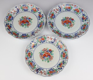 A pair of 19th Century Chinese shaped plates decorated with panels of peony and flowers 31cm (both cracked), ditto 9cm 