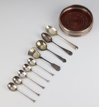 A Georgian style silver coaster London 2000 and minor spoons, weighable silver 129 grams 