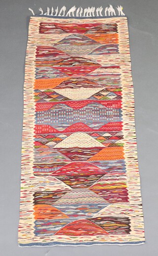 A white and red ground Kilim rug 152cm  x 64cm 