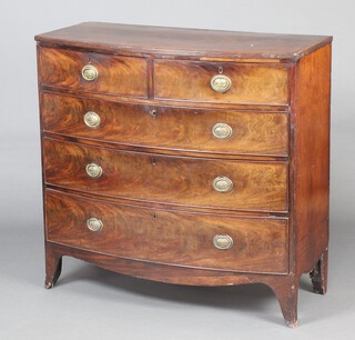 A Victorian inlaid mahogany bow front chest of 2 short and 3 long drawers with replacement brass oval plate drop handles 102cm h x 97cm w x 50cm d 