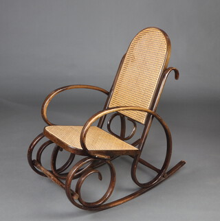 A Thonet style bentwood chair with woven cane seat and back 97cm h x 52cm w  