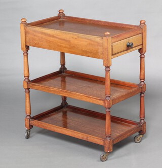 An Edwardian rectangular mahogany 3 tier tea trolley fitted 2 drawers, raised on turned supports 81cm h x 170cm w x 41cm d 