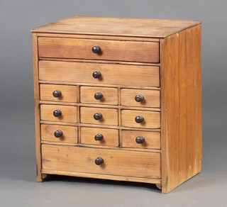 A Victorian rectangular pine apprentice chest fitted 3 long and 9 short drawers with turned handles, 34cm h x 31cm w x 22cm d 