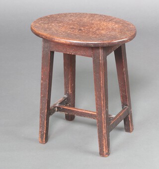 A Victorian oval mahogany stool, raised on square tapered supports with H framed stretcher 45cm h x 39cm w x 29cm d 