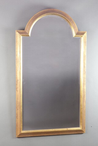 A 19th Century style arched bevelled plate mirror contained in a decorative gilt frame 106cm h x 60cm w 