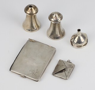 A silver match book holder London 1923, stamp envelope, 2 pepperettes and a funnel, 45 grams 