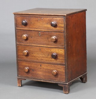 A 19th Century rectangular mahogany chest of 4 drawers with turned handles, raised on bracket feet 85cm h x 67cm w x 51cm d 