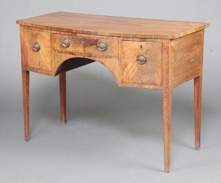 A Georgian inlaid mahogany and crossbanded bow front sideboard fitted a drawer flanked by 2 short drawers, raised on square tapered supports 83cm h x 115cm w x 56cm d