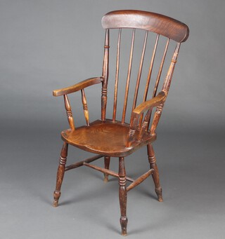 A 19th Century elm and beech stick and rail back Windsor carver chair with solid seat and turned supports with H framed stretcher 100cm h x 56cm w x 41cm d, marked to the back of the seat W C 