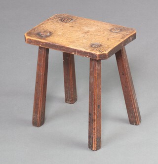 An 18th/19th Century octagonal elm stool, raised on chamfered supports 29cm h x 27cm w x 19cm d 