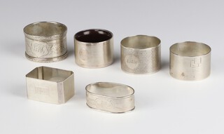 A silver napkin ring Birmingham 2010, 5 others 209g and a mounted ditto (6)