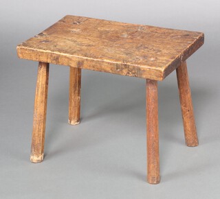 An 18th Century rectangular elm stool, raised on turned supports 40cm h x 51cm w x 33cm d 