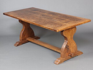 A 17th Century style oak refectory dining table, raised on standard end supports with H framed stretcher 75cm h x 185cm l x 81cm w  