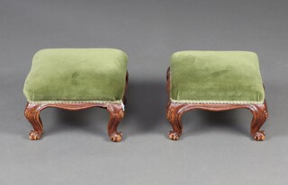 A pair of Victorian square carved mahogany show frame stools, raised on cabriole supports 19cm h x 30cm w x 30cm d 