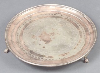 An Edwardian silver plated salver on paw feet 35cm 