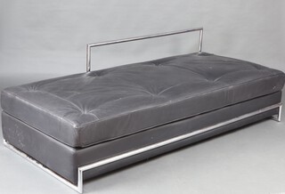 In the manner of Le Corbusier's Furniture,  a chrome and black leather sofa/day bed 61cm h x 120cm w x 84cm d 