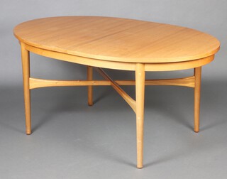 A mid-century teak oval extending dining table with concealed extra leaf, raised on turned supports with H framed stretcher 74cm h x 159cm l x 98cm w (light water and contact marks in places)