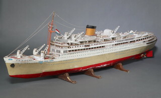 A large and impressive wooden model of the liner Oranje 56cm h x 254cm l x 35cm w (The model is in barn condition, some damage to life boats) 