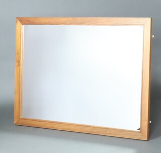 A rectangular plate mirror contained in an American walnut frame 142cm x 100cm 