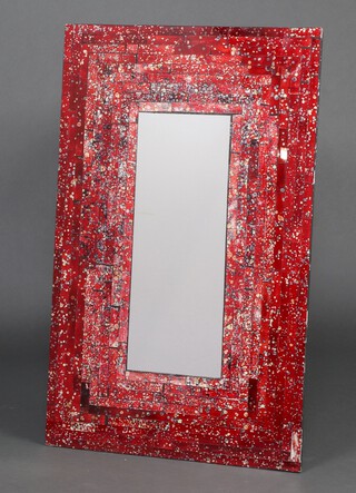 A rectangular plate wall mirror contained in a red tiled frame 80cm h x 49cm w