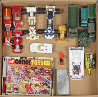 A 1970 Corgi toy car brochure together with 8 others and a small collection of various toy cars 