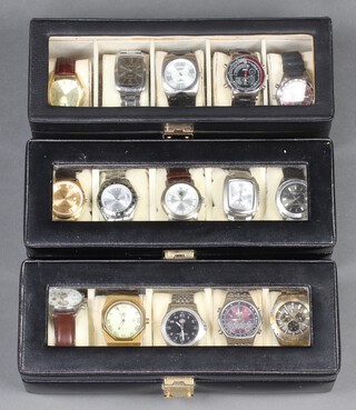 Fifteen gentleman's fashion watches contained in a 3 rectangular cases 