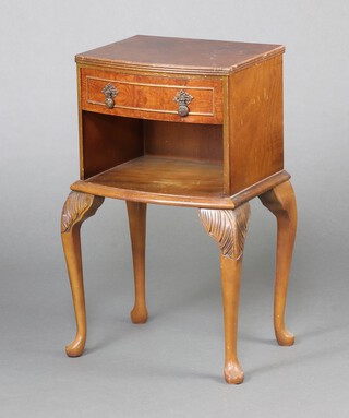 A Queen Anne style walnut bow front bedside cabinet fitted a drawer above recess, raised on cabriole supports 70cm h x 39cm w x 32cm d 