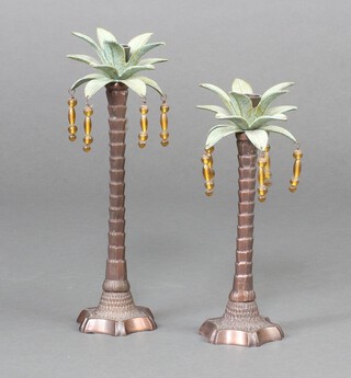 A Regency style bronze candlestick in the form of a palm tree 35cm and 1 other 29cm 