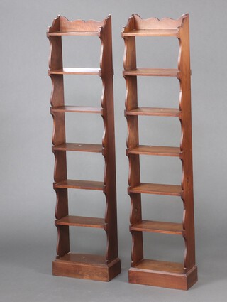 A pair of 19th Century style mahogany 7 tier shelves 143cm h x 32cm w x 15cm d 