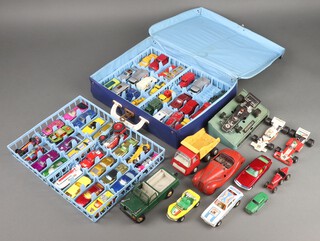 A collection of Matchbox and other toy cars, contained in a Matchbox Collector's case no.41 and a collection of play worn toy cars, a Schuco Exmico 4001 racing car (no key) 