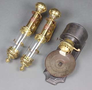 A pair of reproduction GWR carriage lanterns and  a 19th Century wall mounted oil lamp 