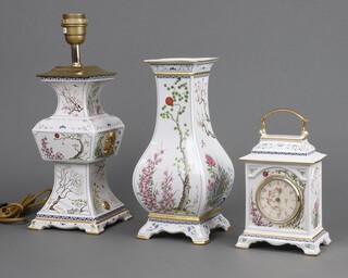 A Franklin Mint porcelain timepiece 22cm, ditto vase 30cm and a table lamp 30cm 