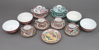 Four Japanese tea cups and saucers, 2 lidded bowls and stands, 4 bowls and a saucer   