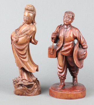 Two Chinese carved hardwood figures of a standing lady and gentleman with hardstone eyes 25cm x 11cm 