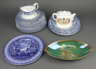 A Crown Devon Ware boat shaped dish, a Ringtons rectangular pottery teapot to commemorate the 1935 Jubilee of George V, a Maling blue and white plate decorated a temple 28cm (cracked) and a blue and white Rington dinner service 