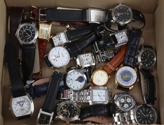 Twenty gentleman's fashion wristwatches, contained in display cases (sold as seen and may require new batteries)